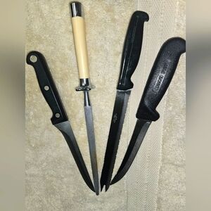 Three knives, one sharpener. Different top brands. Excellent condition!